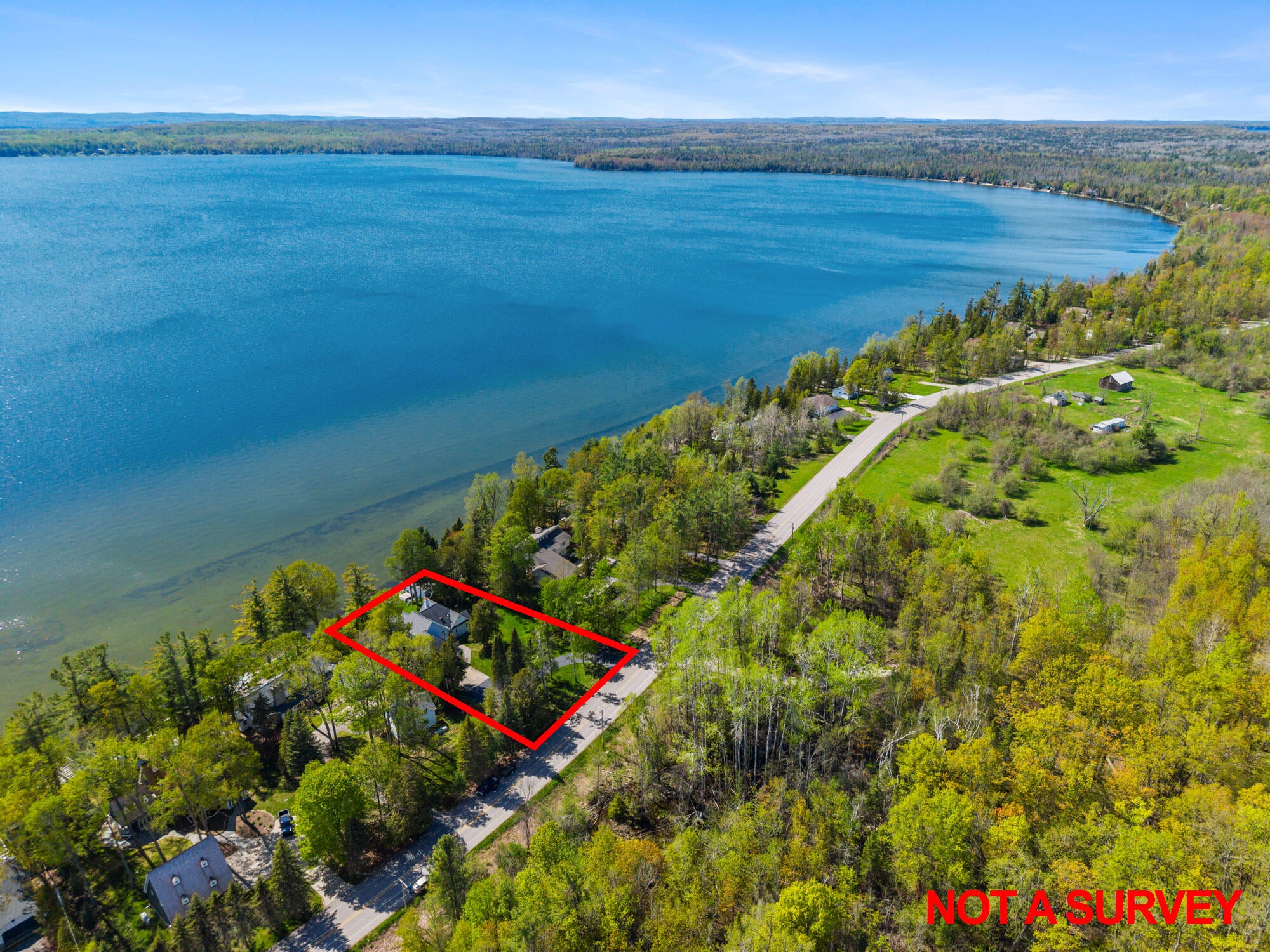 4457 East Burt Lake Road Cheboygan, MI 49721 - Photo 42 of 76 DJI_20260521161544_0021_D-Edit