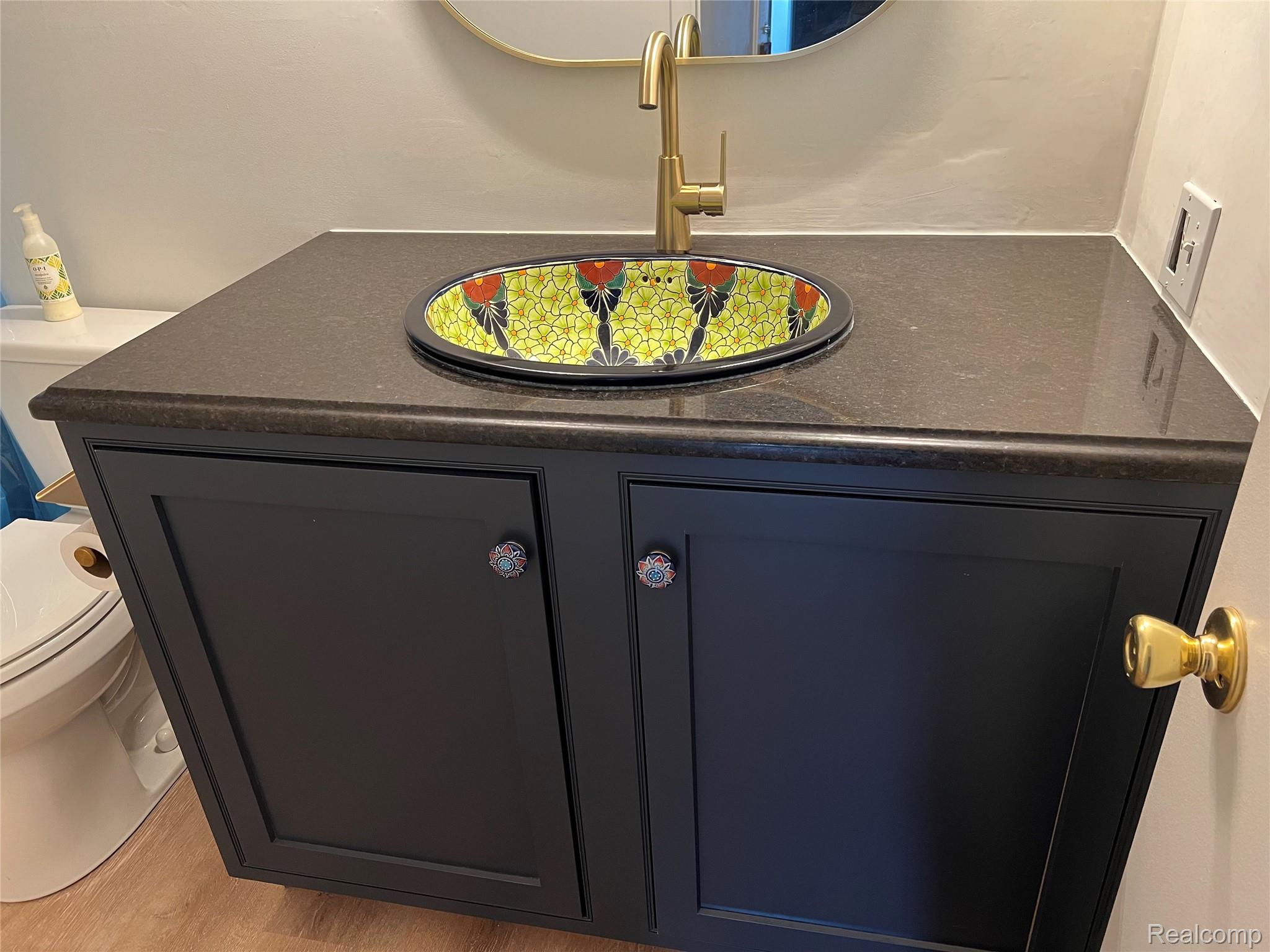 7352 Dale Center Line, MI 48015 - Photo 11 of 22 Bathroom view of toilet and vanity