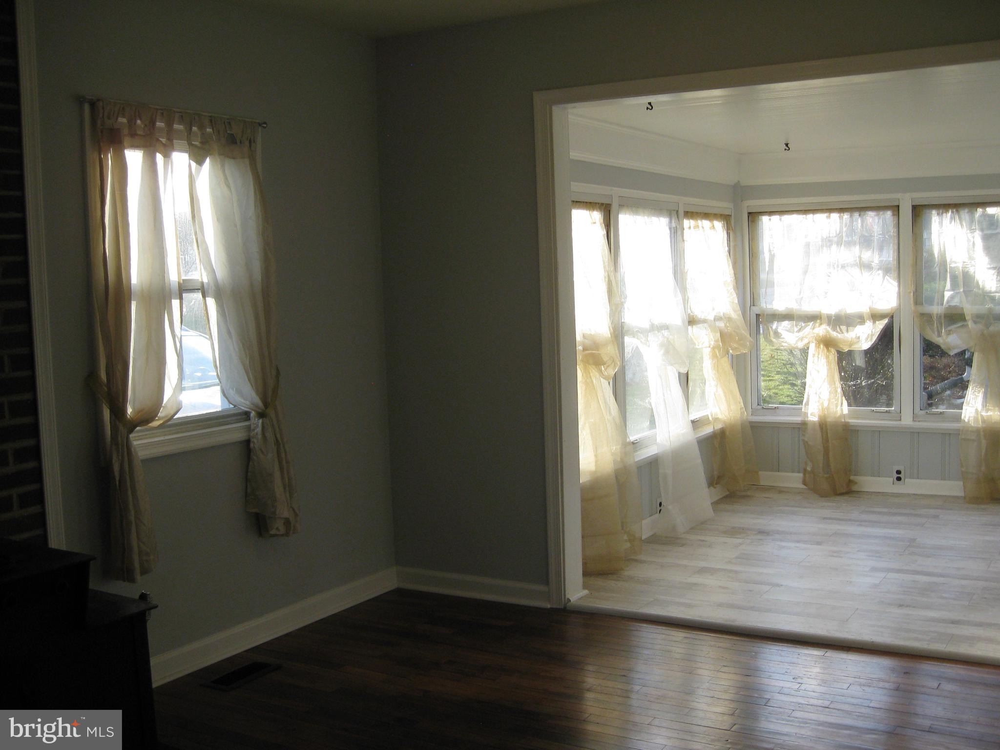 14 Lea Road New Castle, DE 19720 - Photo 5 of 21 Dining area looking into sunroom