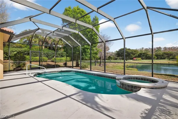 a view of a swimming pool with a backyard
