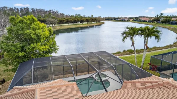 a view of a backyard and a chair
