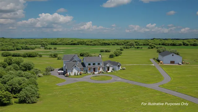 a view of a swimming pool with a table and chairs