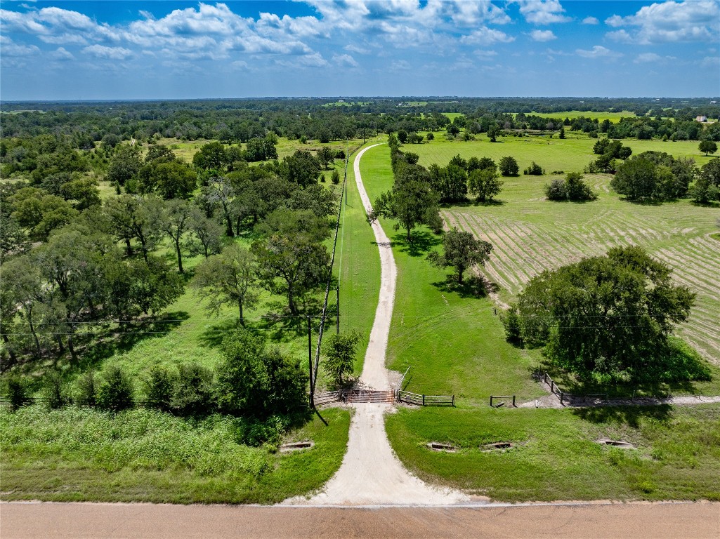 1220 Waldeck Road Ledbetter, TX 78946 - Photo 3 of 14 an aerial view of a golf course with houses