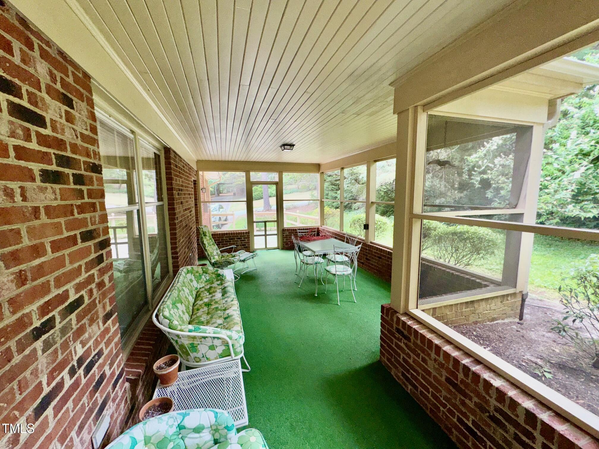 1818 Brookrun Road Henderson, NC 27536 - Photo 35 of 38 Rear Screen Porch