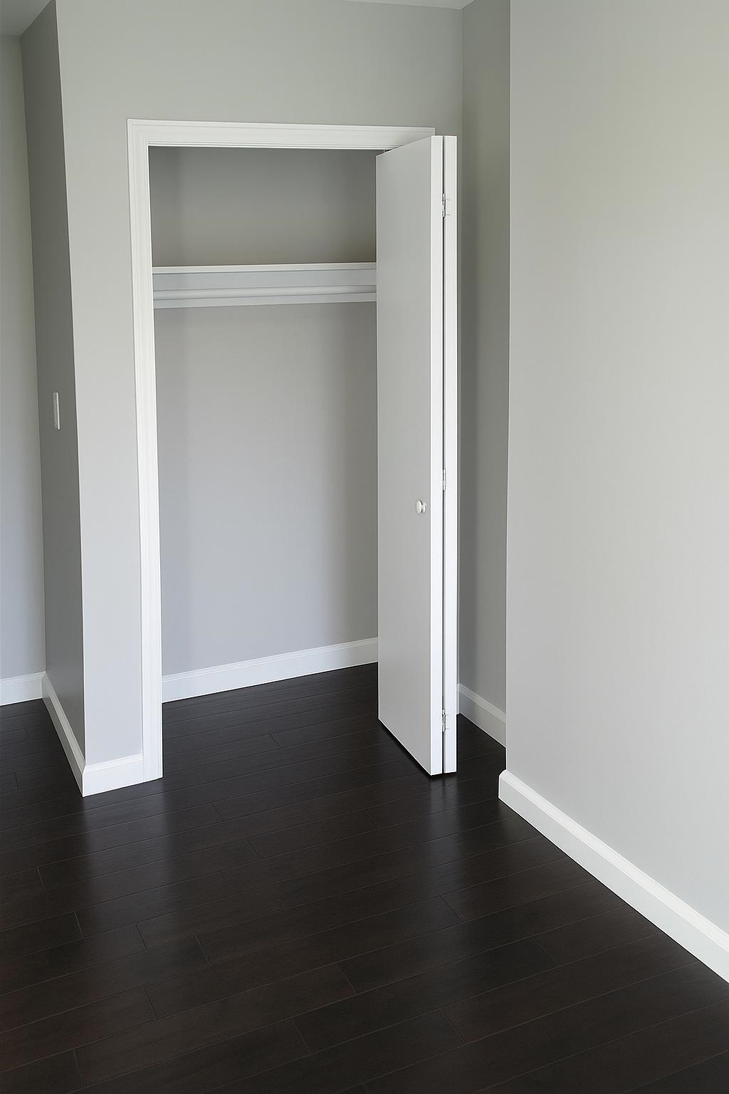 509 Washington Street, Unit 3 Hoboken, NJ 07030 - Photo 5 of 17 an empty room with wooden floor and closet