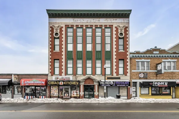a view of a building and a street
