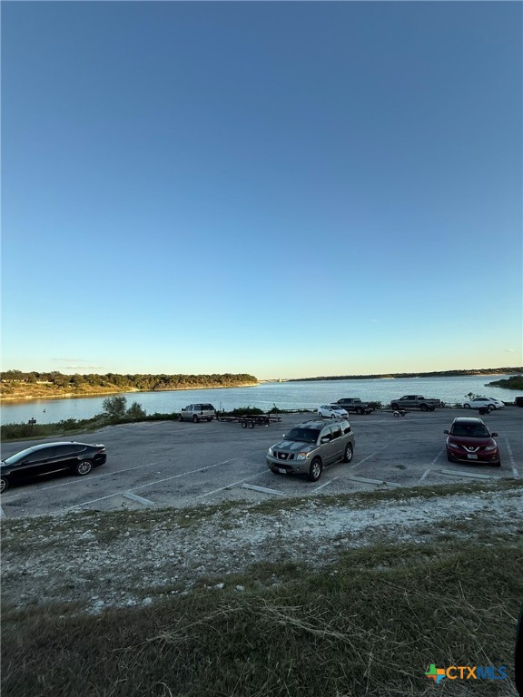 119 Daisy Trail Belton, TX 76513 - Photo 4 of 7 a view of a lake with a car