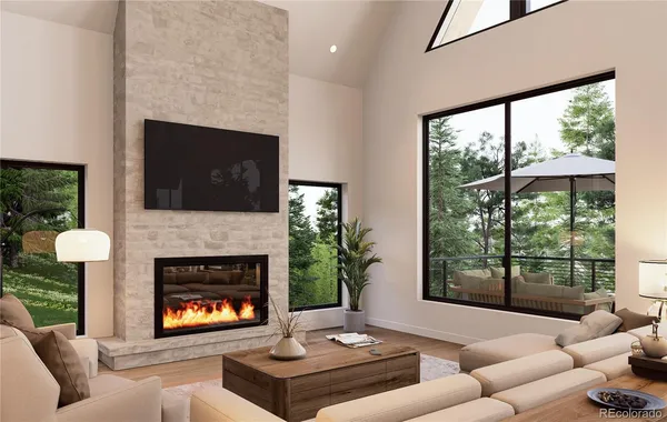 a living room with furniture a fireplace and a large window