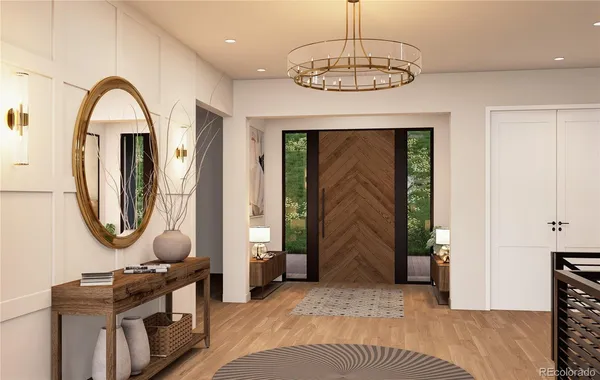 a view of a livingroom with furniture and a front door