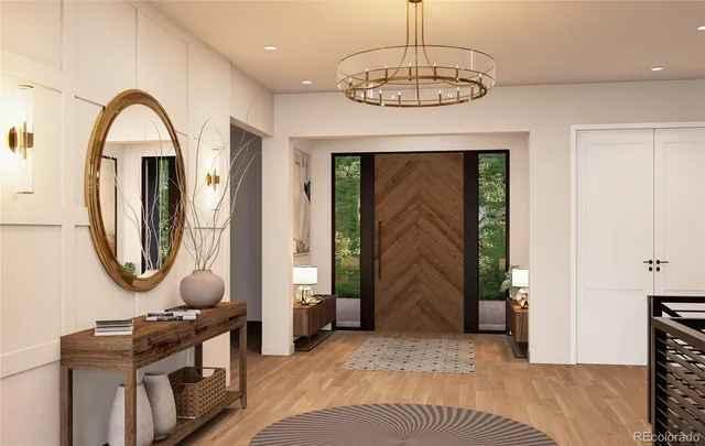 a view of a livingroom with furniture and a front door