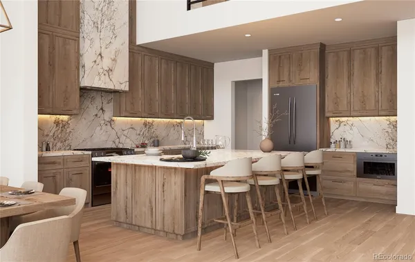 a kitchen with stainless steel appliances kitchen island granite countertop a stove a sink a dining table and chairs