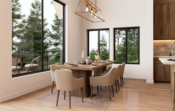 a dining room with furniture window and wooden floor