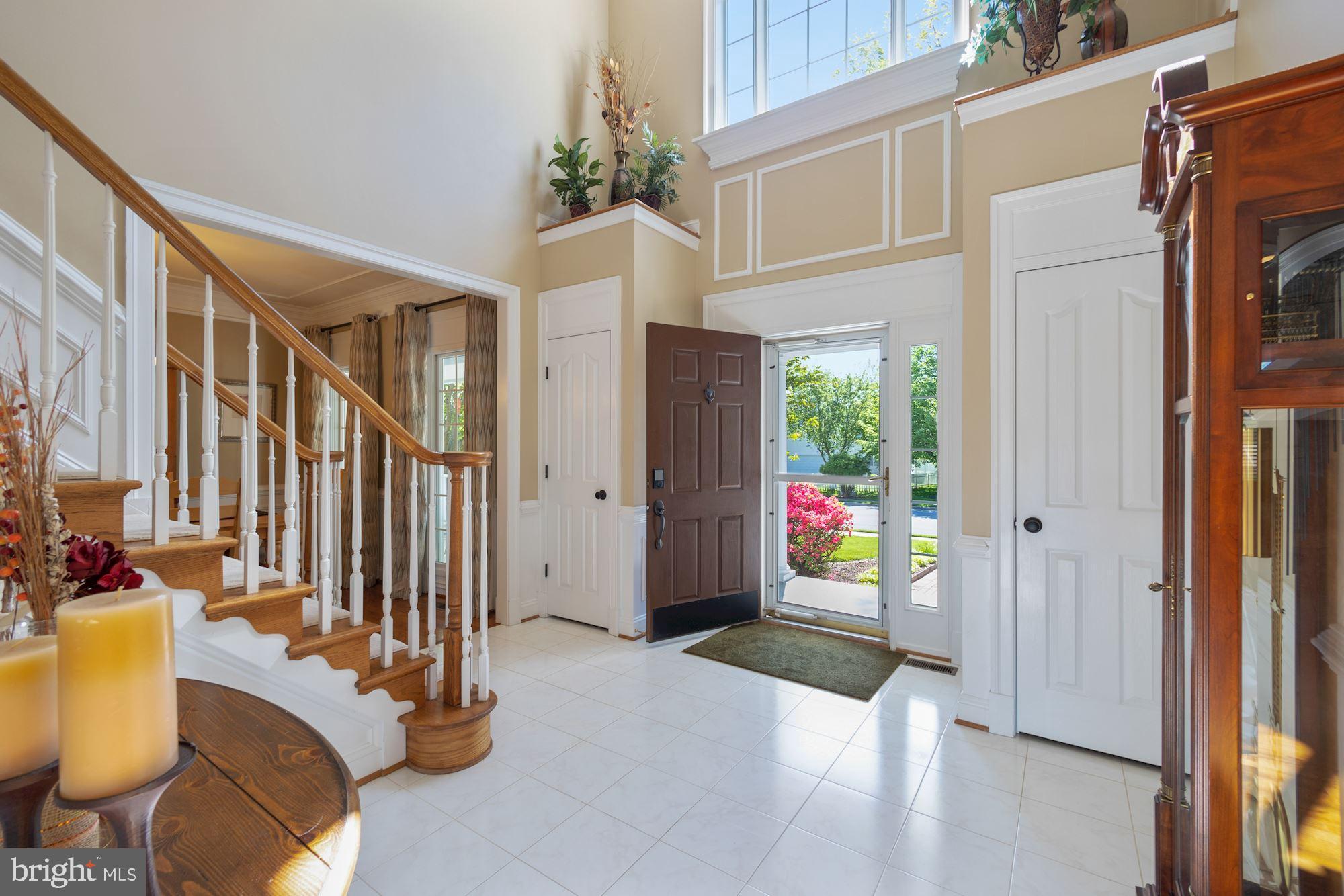 604 Glenmeade Circle Purcellville, VA 20132 - Photo 15 of 54 Dramatic two-story foyer flanked by two closets