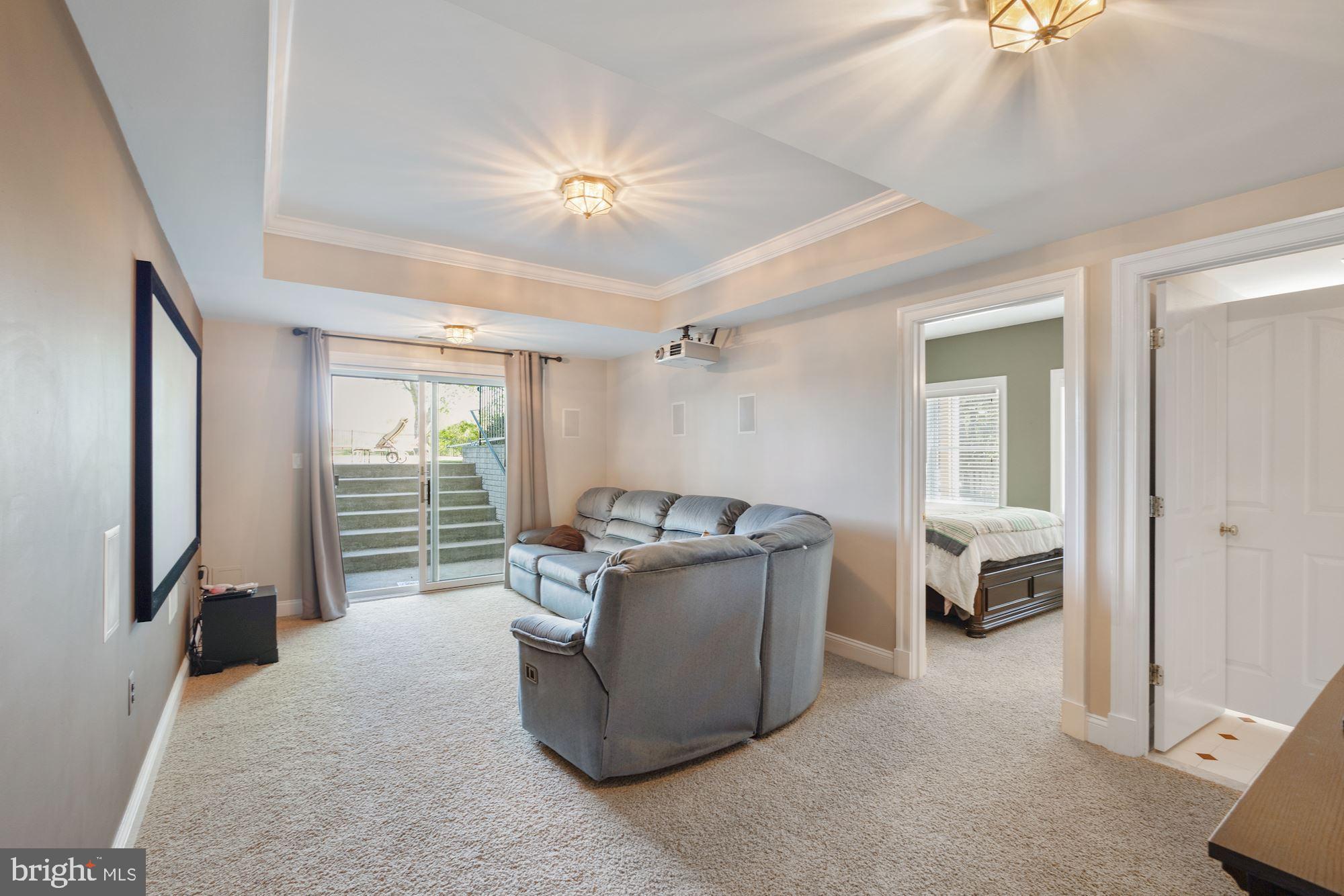 604 Glenmeade Circle Purcellville, VA 20132 - Photo 37 of 54 Basement rec room with walk-up exit stairs