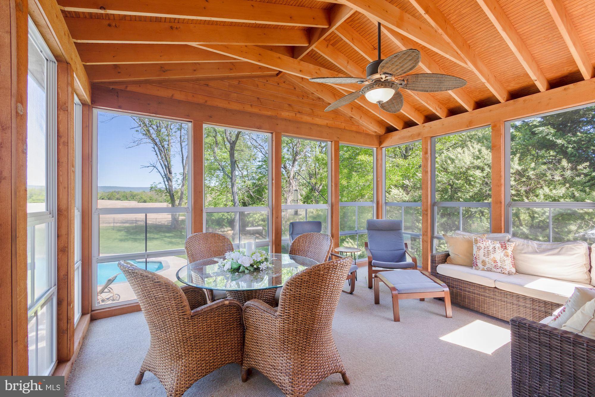 604 Glenmeade Circle Purcellville, VA 20132 - Photo 40 of 54 3 season room overlooking the pool
