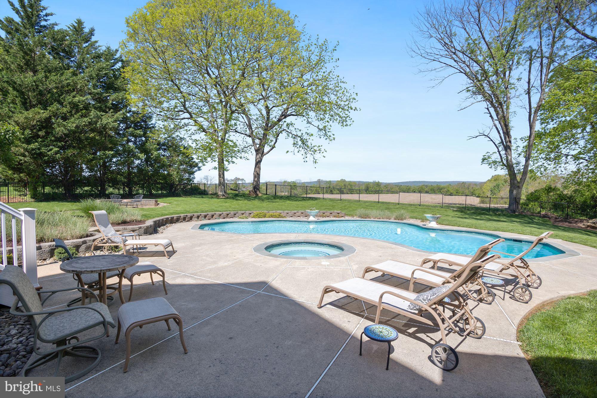 604 Glenmeade Circle Purcellville, VA 20132 - Photo 45 of 54 Gunite in-ground pool with hot tub