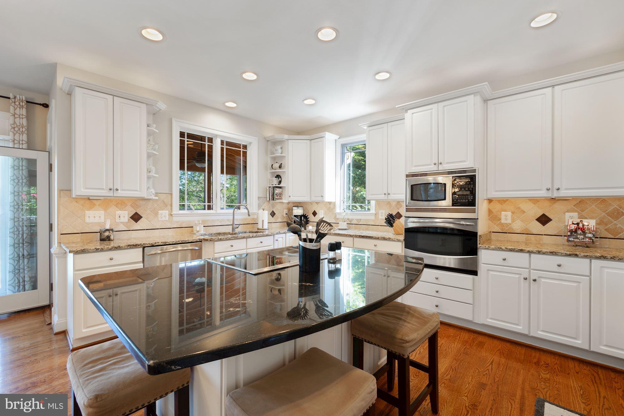 604 Glenmeade Circle Purcellville, VA 20132 - Photo 9 of 54 Center island with induction cook-top