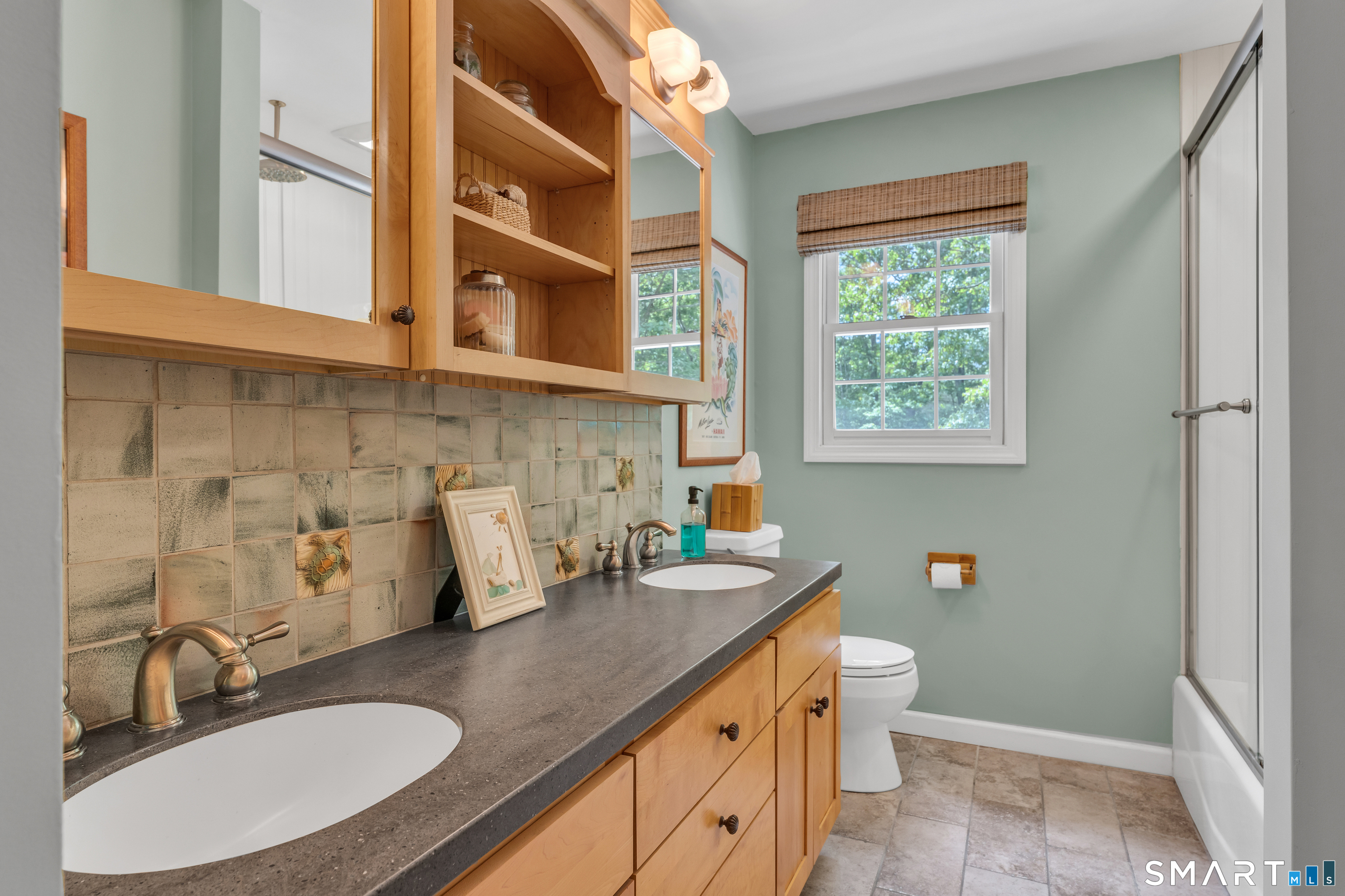 46 Laurel Cliffs Road Guilford, CT 06437 - Photo 22 of 40 Double sinks in the Hall Bath. Tub/Shower combo.