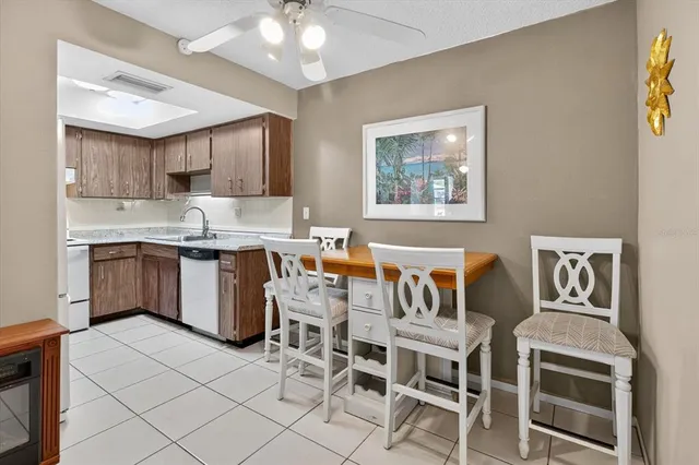 a view of kitchen with cabinets and wooden floor