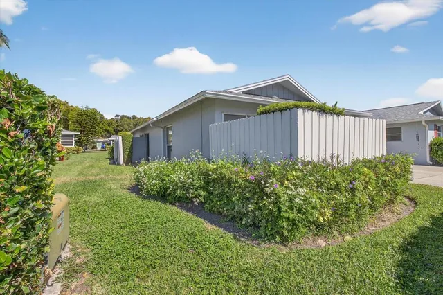 a house view with a garden space