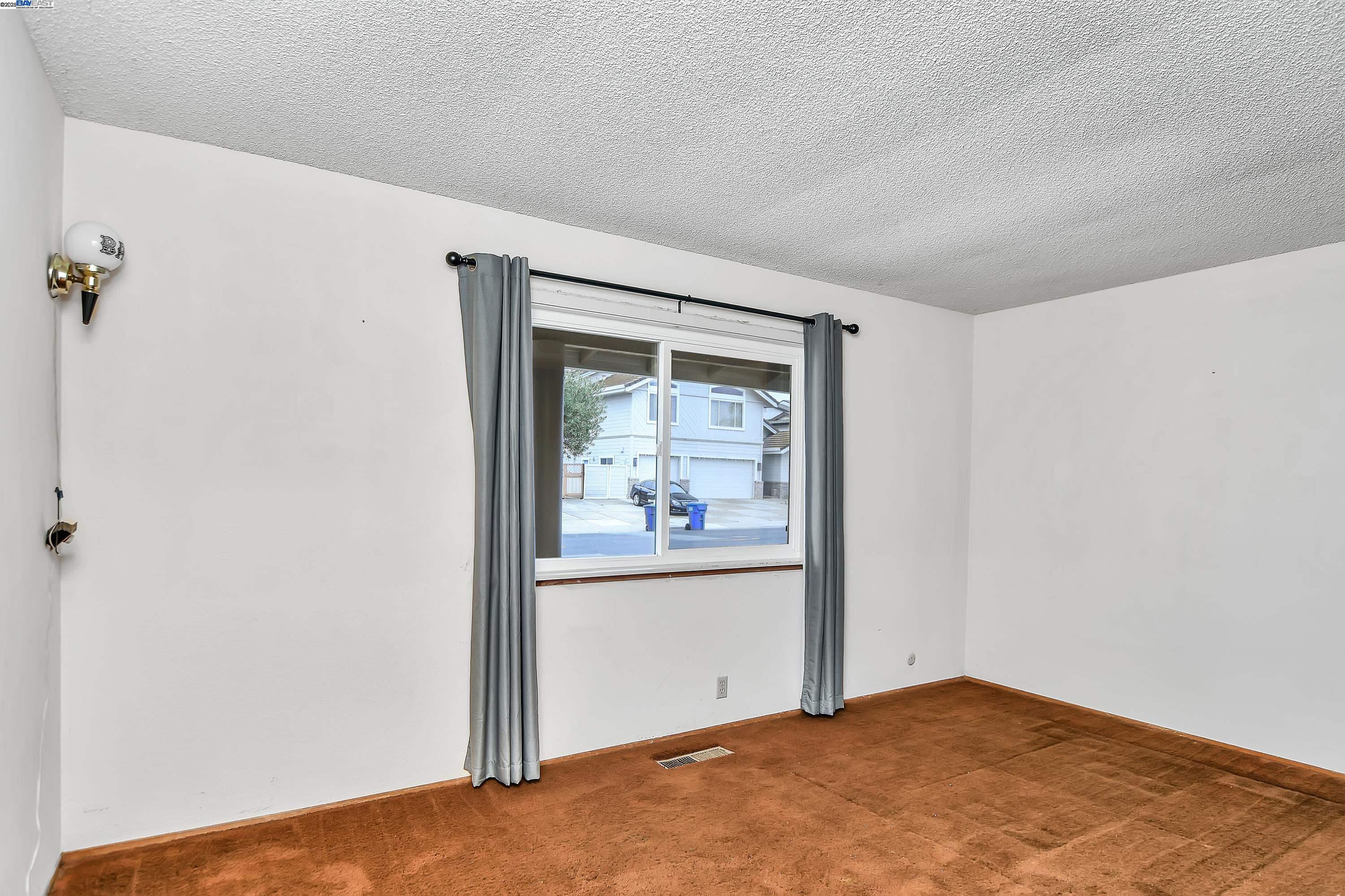 1402 Willow Lake Road Discovery Bay, CA 94505 - Photo 18 of 33 an empty room with window
