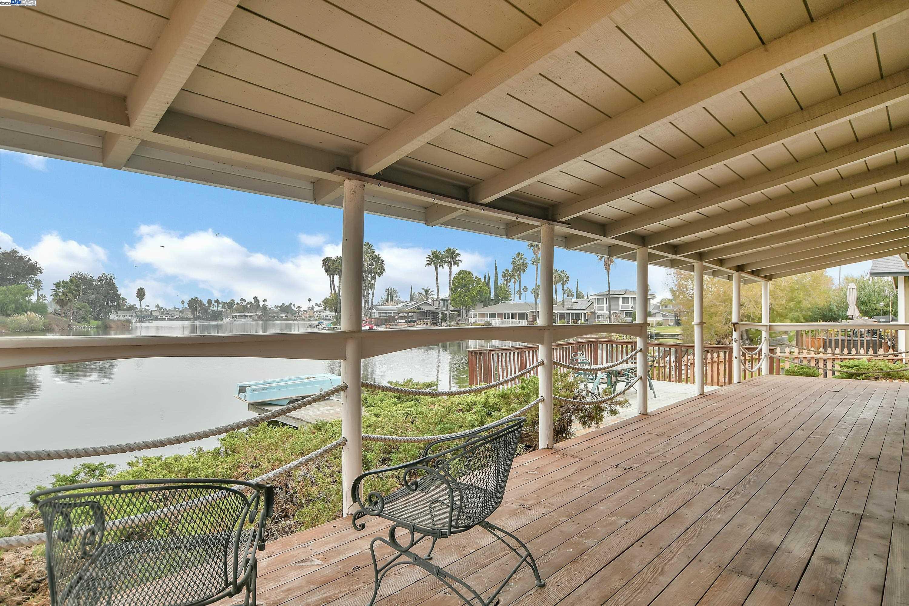 1402 Willow Lake Road Discovery Bay, CA 94505 - Photo 25 of 33 a view of a swimming pool with a lounge chairs