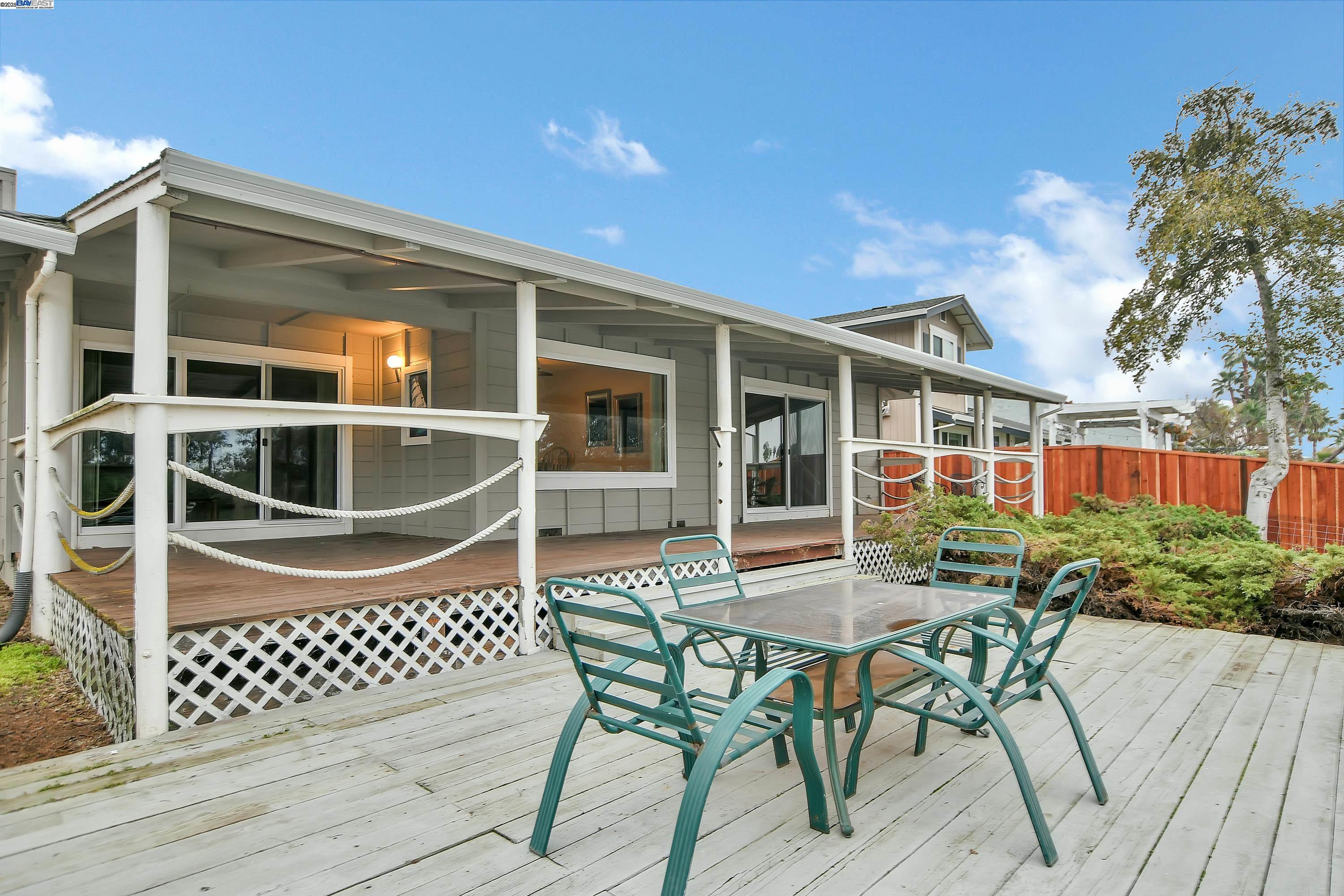 1402 Willow Lake Road Discovery Bay, CA 94505 - Photo 28 of 33 a patio with table and chairs