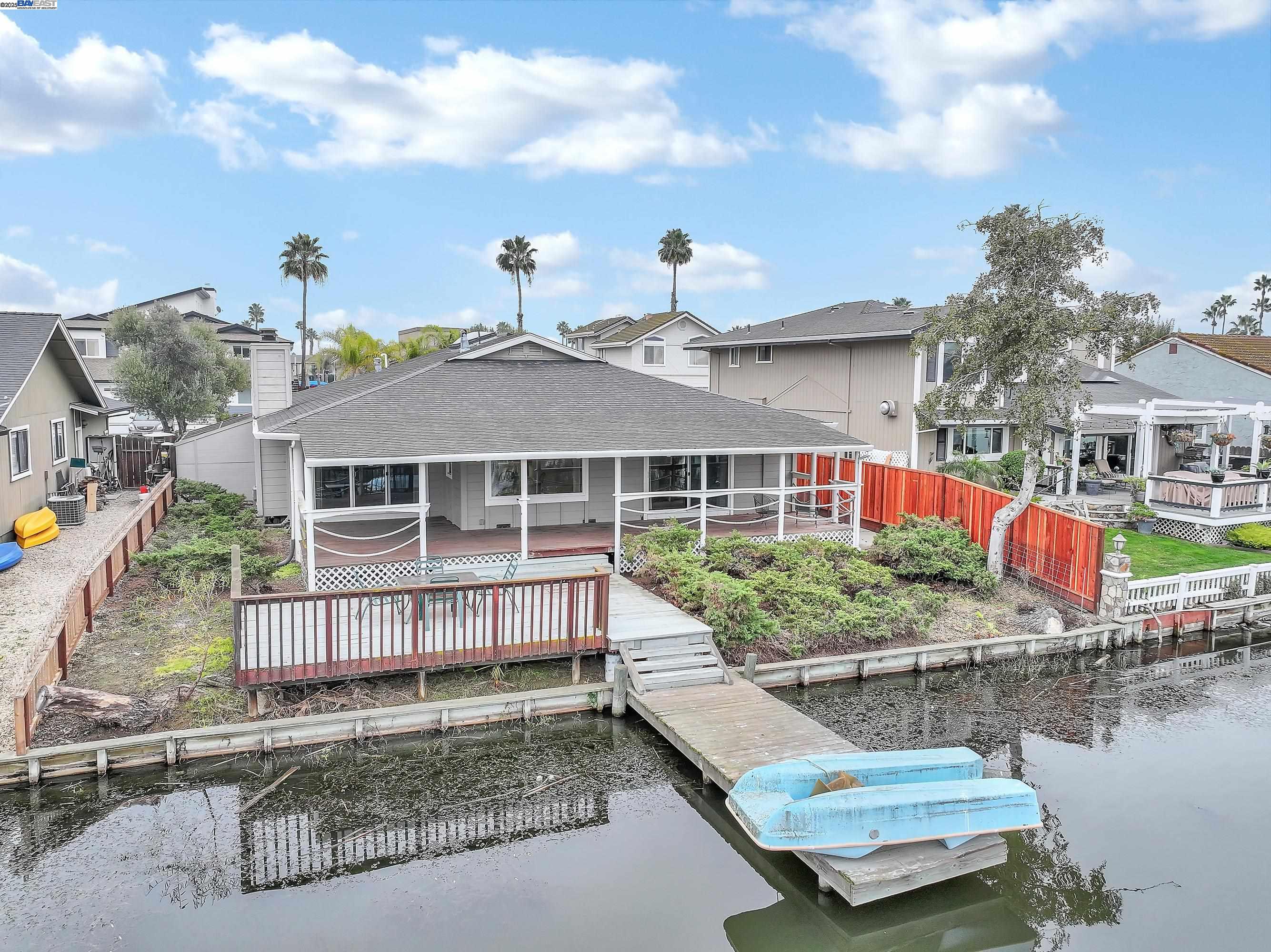 1402 Willow Lake Road Discovery Bay, CA 94505 - Photo 30 of 33 a view of a house with pool and chairs