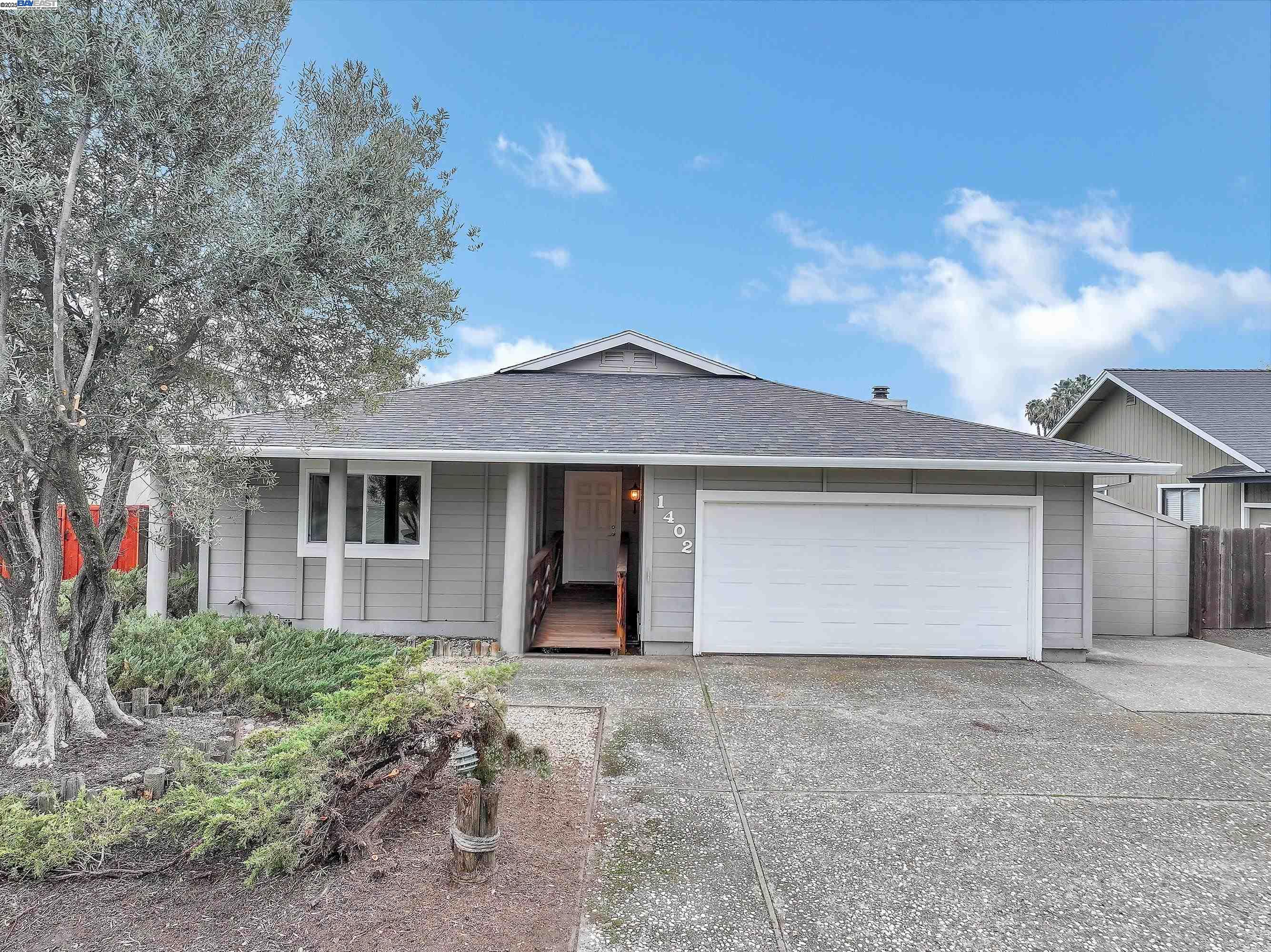 1402 Willow Lake Road Discovery Bay, CA 94505 - Photo 33 of 33 front view of a house with a yard