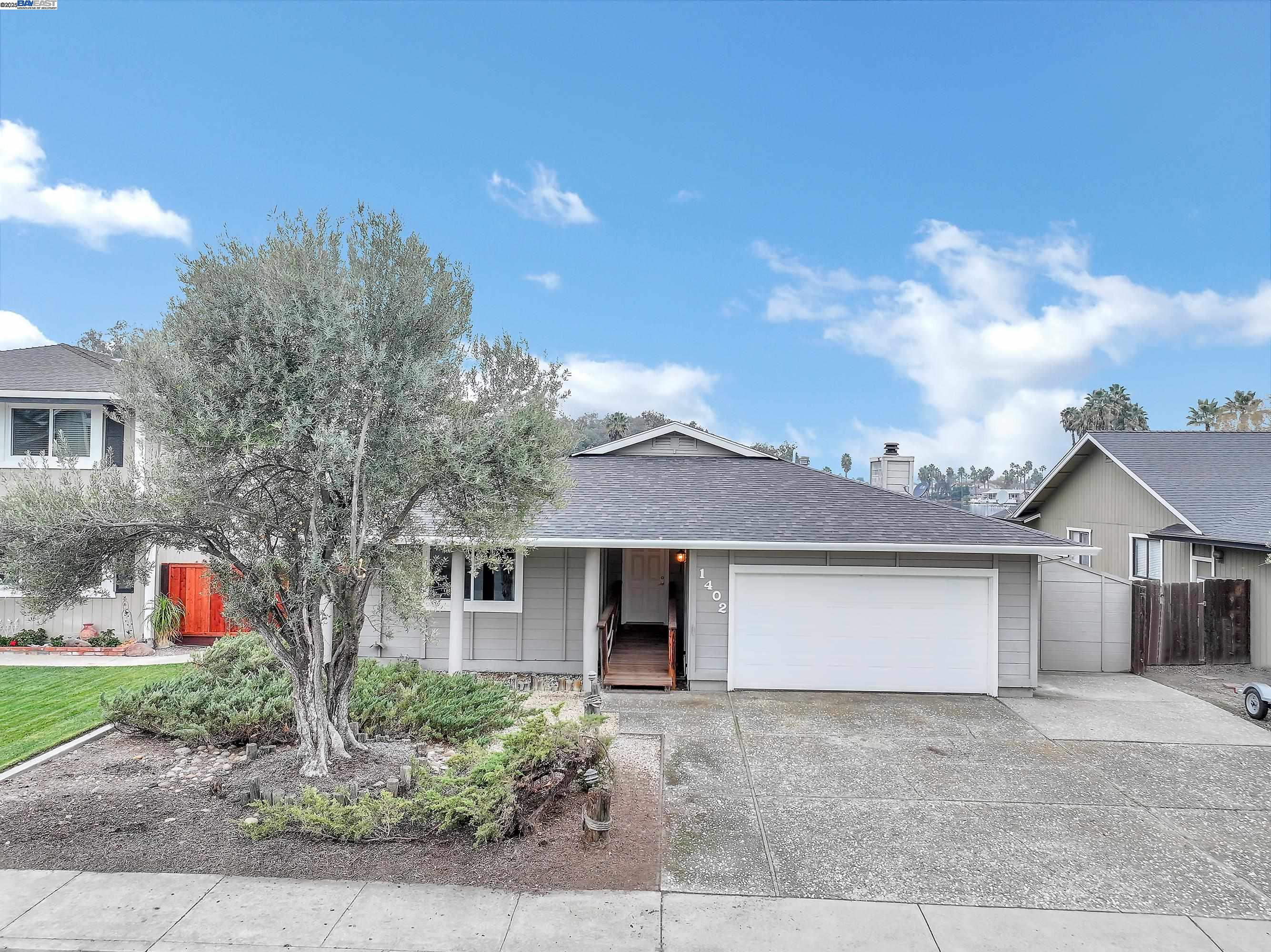 1402 Willow Lake Road Discovery Bay, CA 94505 - Photo 4 of 33 front view of house with a yard