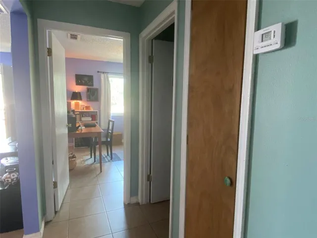 a view of a room that has a bench in it