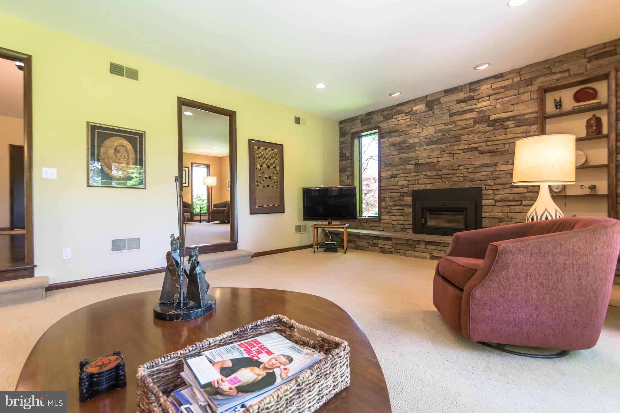 16520 York Road Monkton, MD 21111 - Photo 11 of 30 a living room with furniture and a fireplace