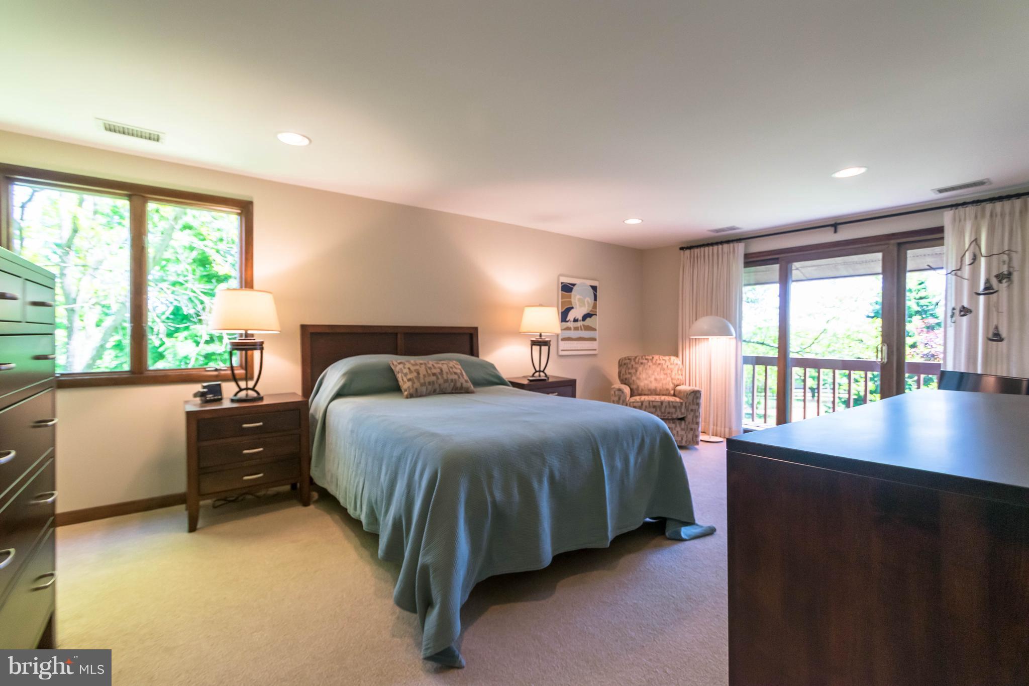 16520 York Road Monkton, MD 21111 - Photo 12 of 30 a spacious bedroom with a bed and a large window