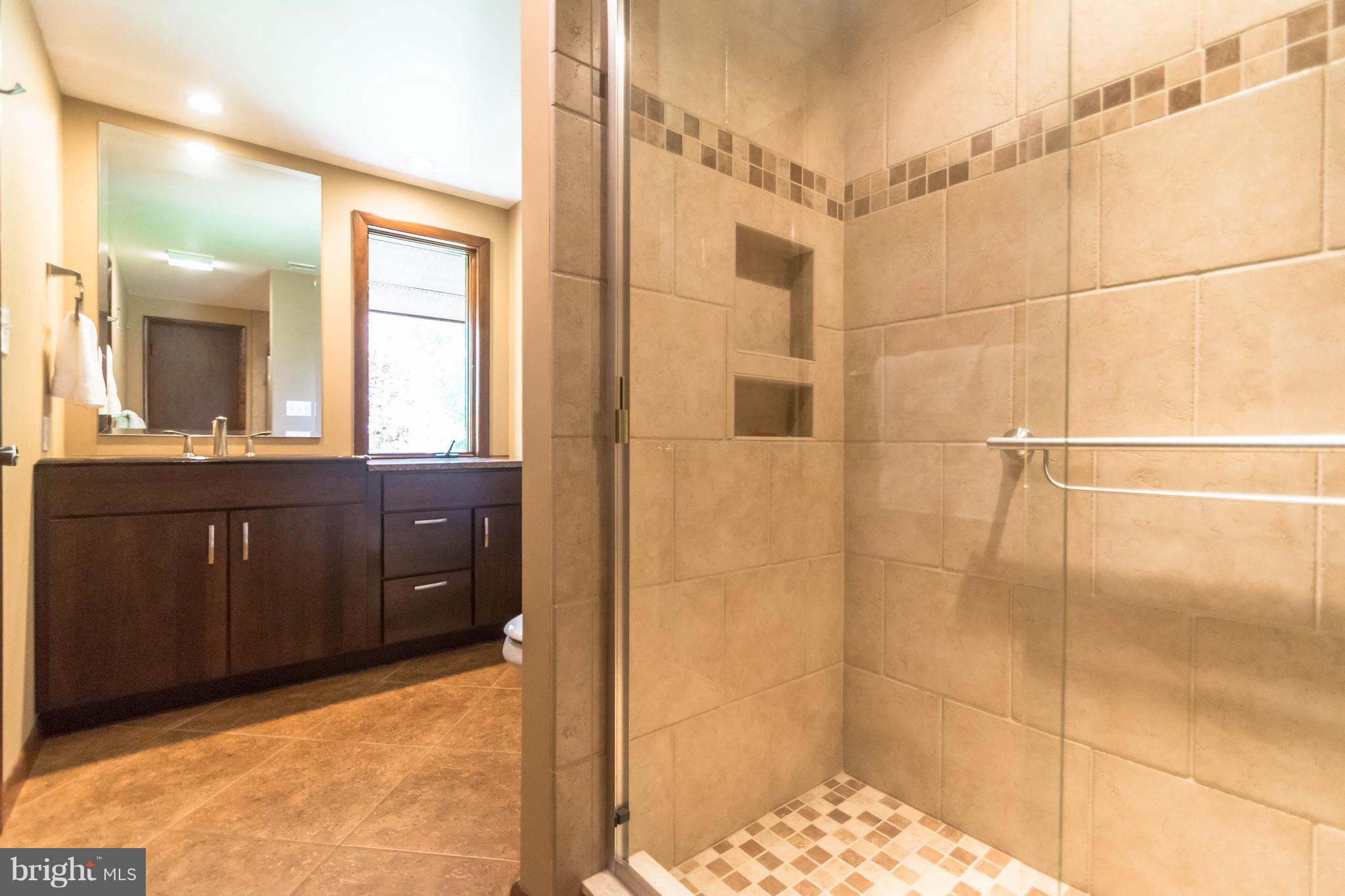 16520 York Road Monkton, MD 21111 - Photo 15 of 30 a bathroom with a sink and a mirror