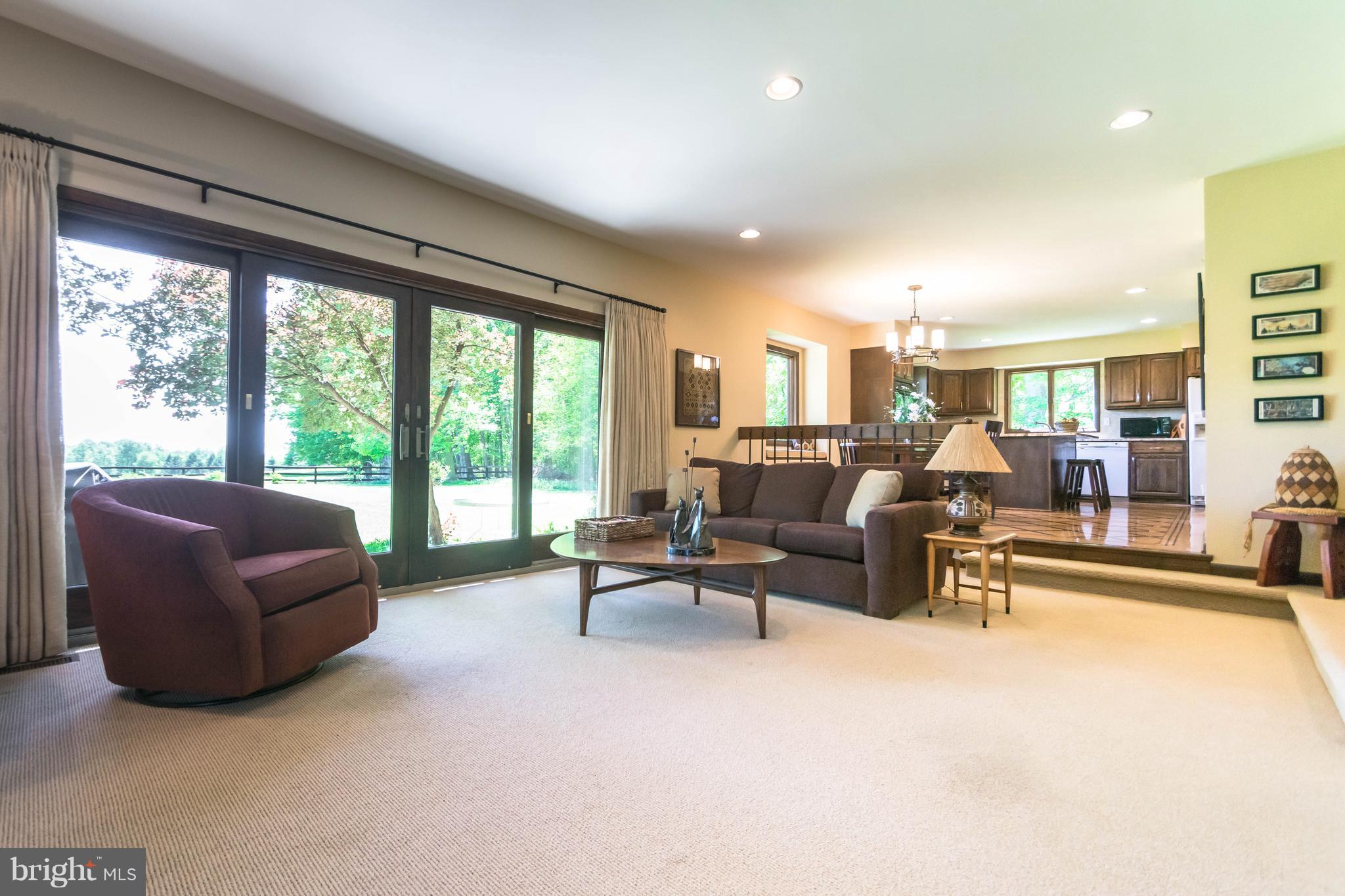 16520 York Road Monkton, MD 21111 - Photo 10 of 30 a living room with furniture and a floor to ceiling window