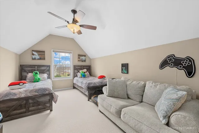 a bed room with furniture and flat screen tv