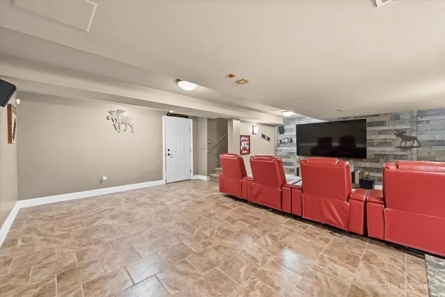 a view of a house with a yard patio and fire pit