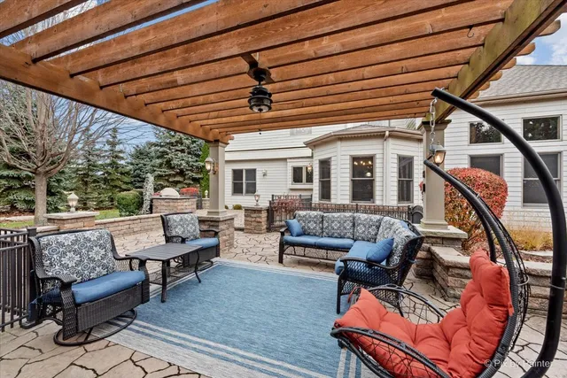 an aerial view of residential house with outdoor space and swimming pool