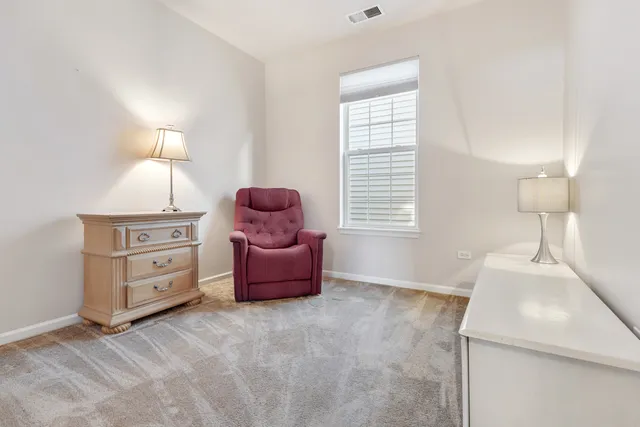 a room with furniture and a window