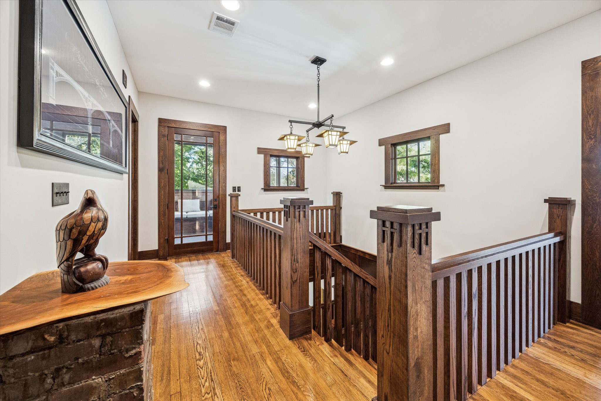 512 Archer Street Houston, TX 77009 - Photo 32 of 40 Reclaimed oak floors are detailed with cherrywood inlay, reproduced from a 1920s Montrose bungalow.