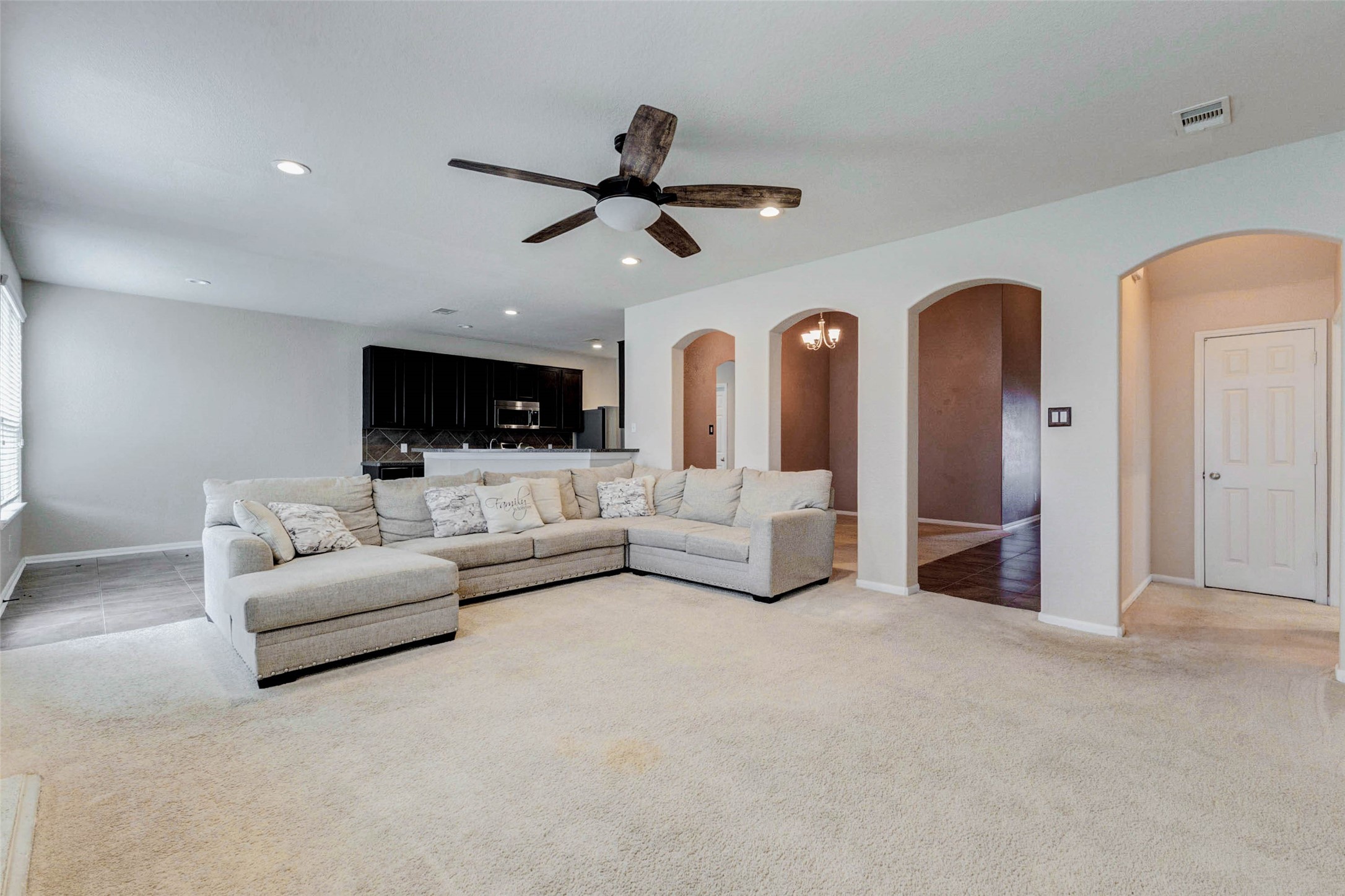 7638 Alum Lane Baytown, TX 77521 - Photo 18 of 44 a living room with furniture and a flat screen tv