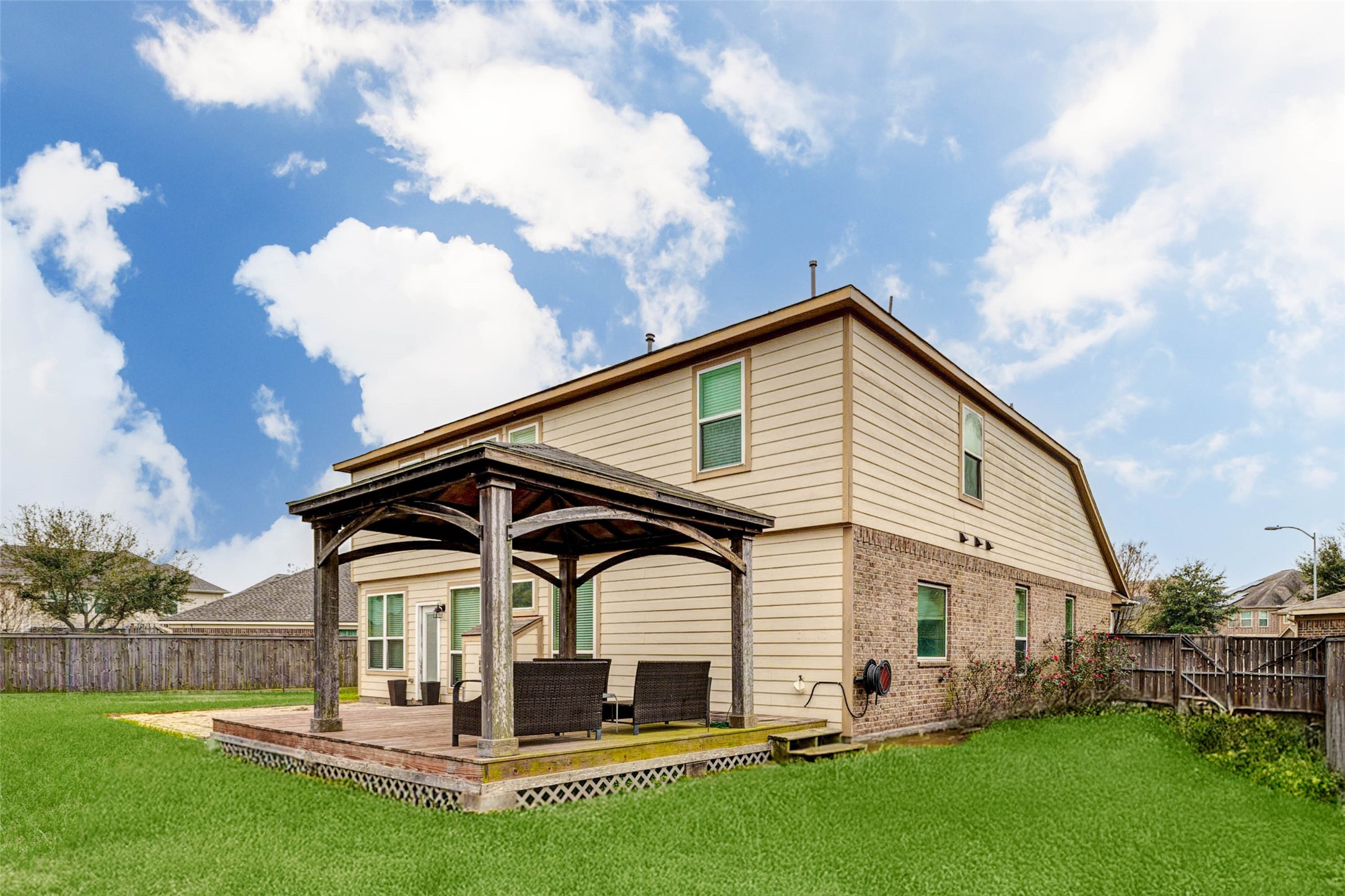 7638 Alum Lane Baytown, TX 77521 - Photo 2 of 44 a view of a house with a yard