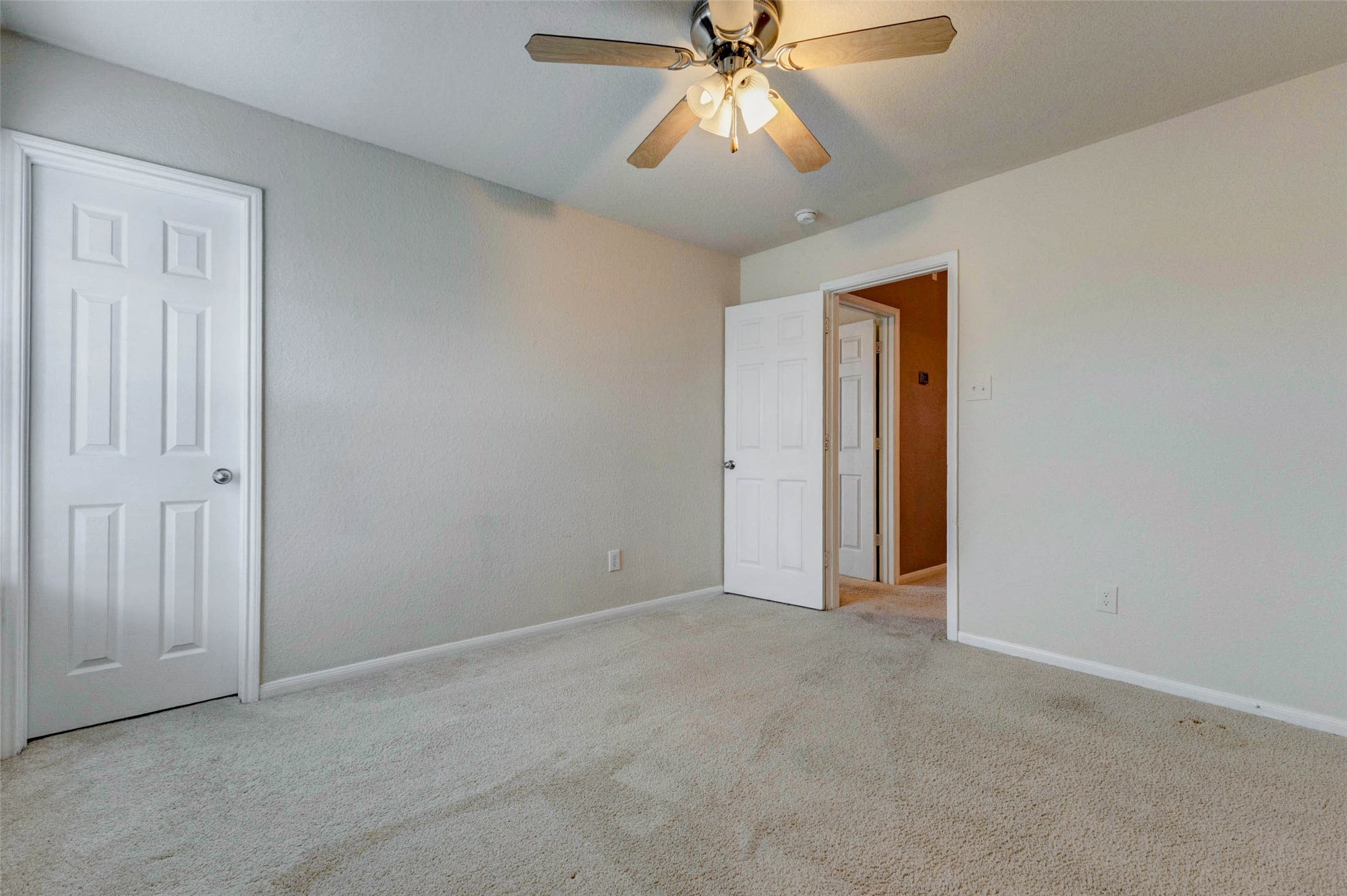 7638 Alum Lane Baytown, TX 77521 - Photo 30 of 44 a view of an empty room and chandelier fan