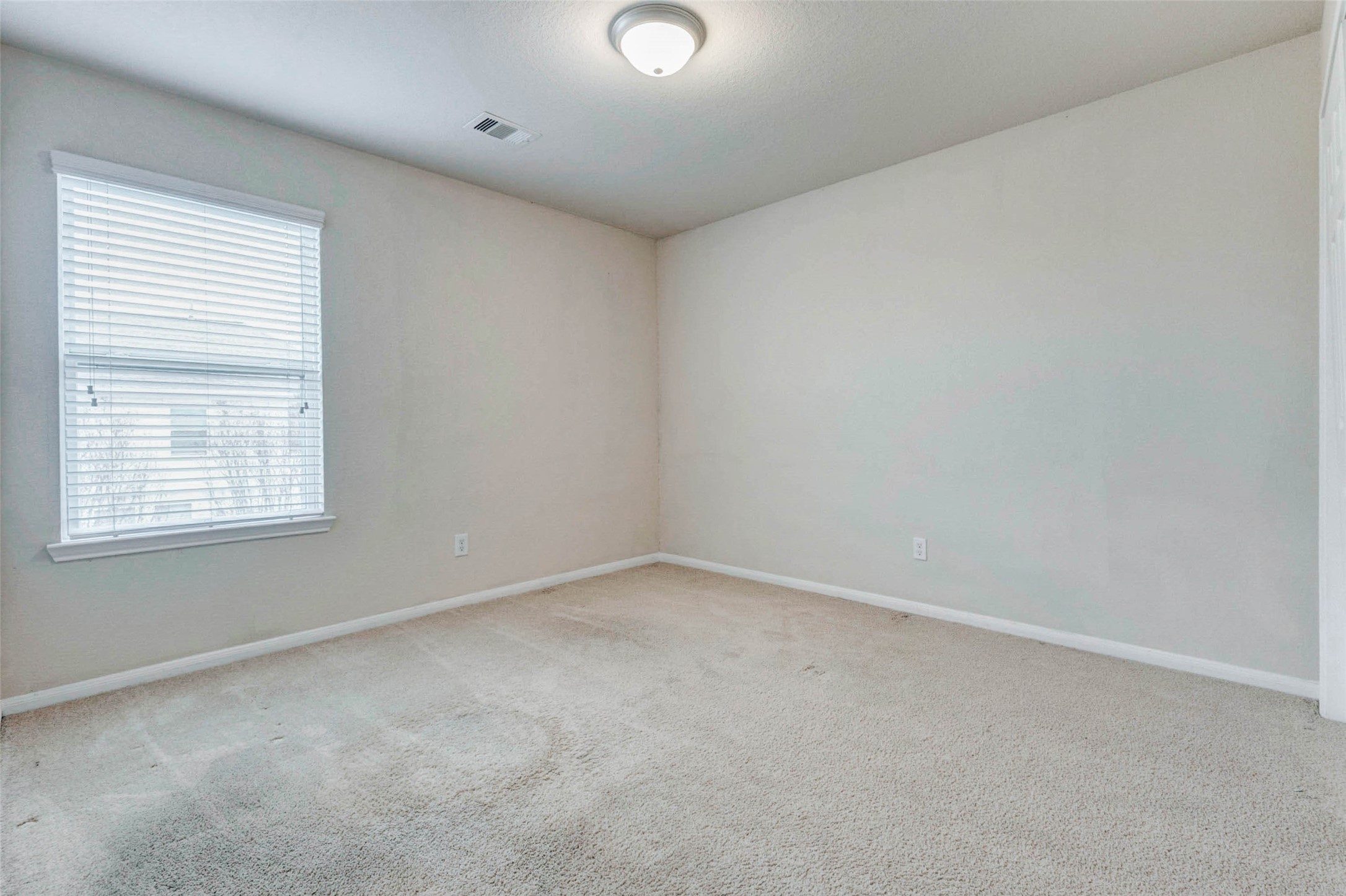 7638 Alum Lane Baytown, TX 77521 - Photo 34 of 44 an empty room with a window