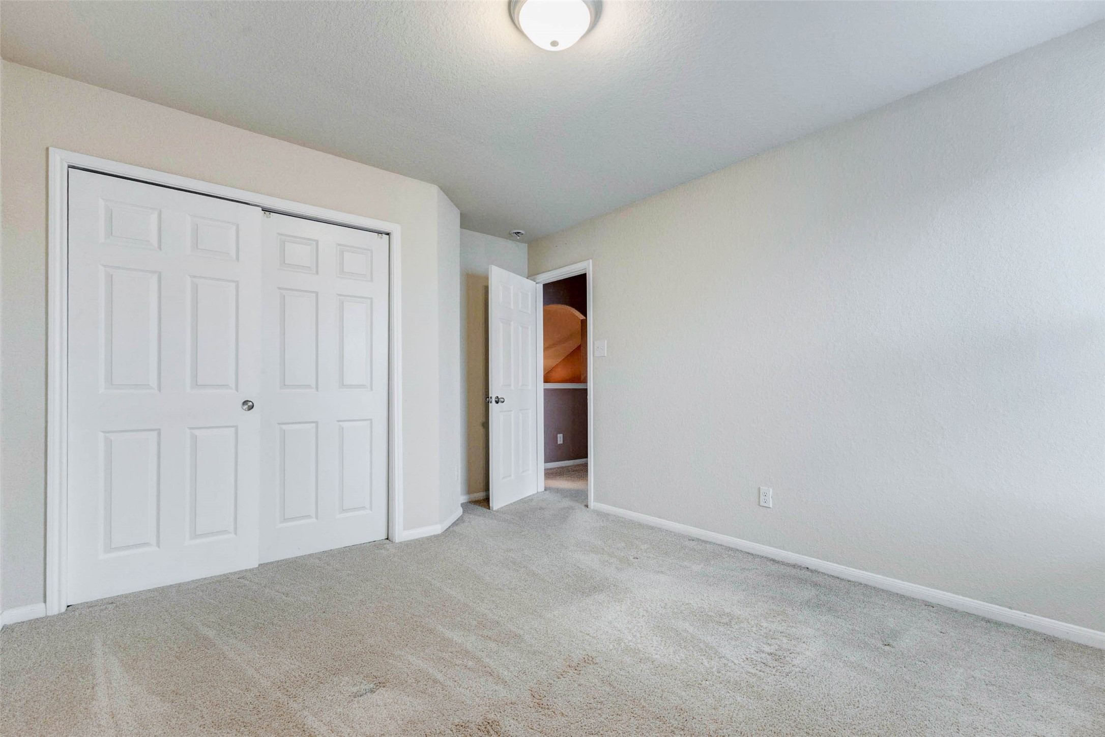 7638 Alum Lane Baytown, TX 77521 - Photo 35 of 44 a view of an empty room and wooden door