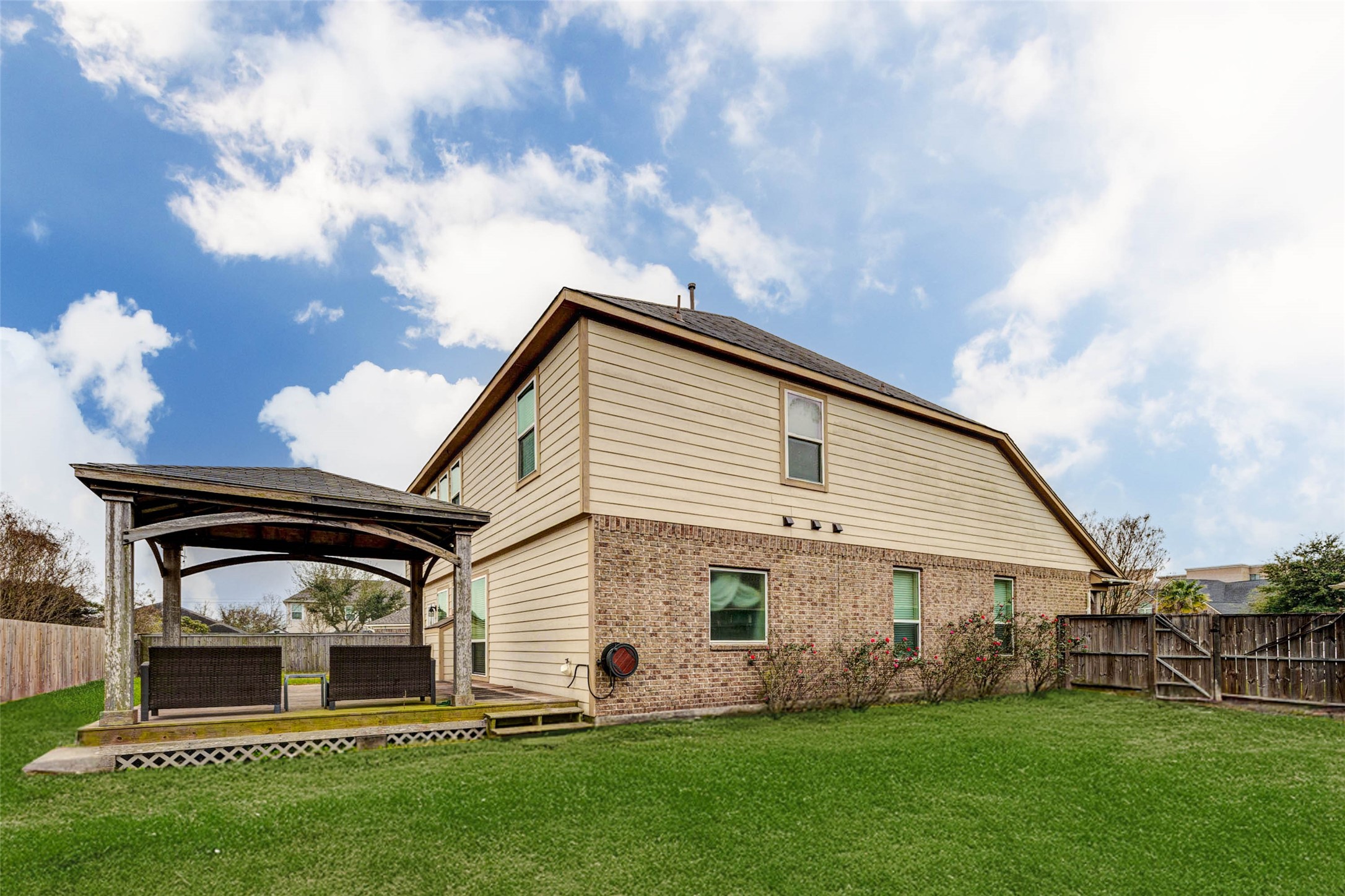 7638 Alum Lane Baytown, TX 77521 - Photo 41 of 44 a front view of house with garden