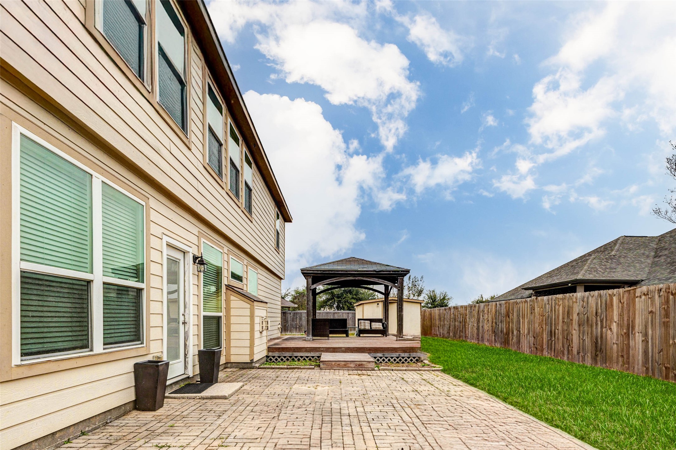 7638 Alum Lane Baytown, TX 77521 - Photo 42 of 44 a front view of a house with garden