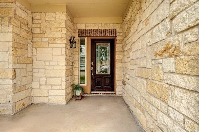 a view of front door of house with an entryway