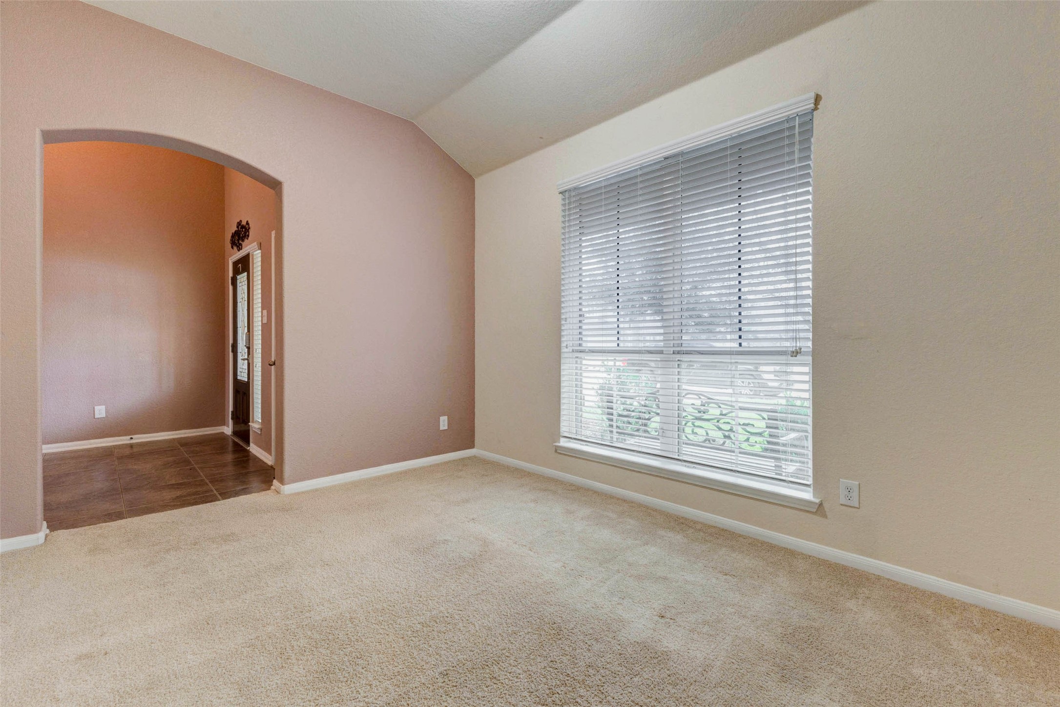 7638 Alum Lane Baytown, TX 77521 - Photo 10 of 44 an empty room with windows