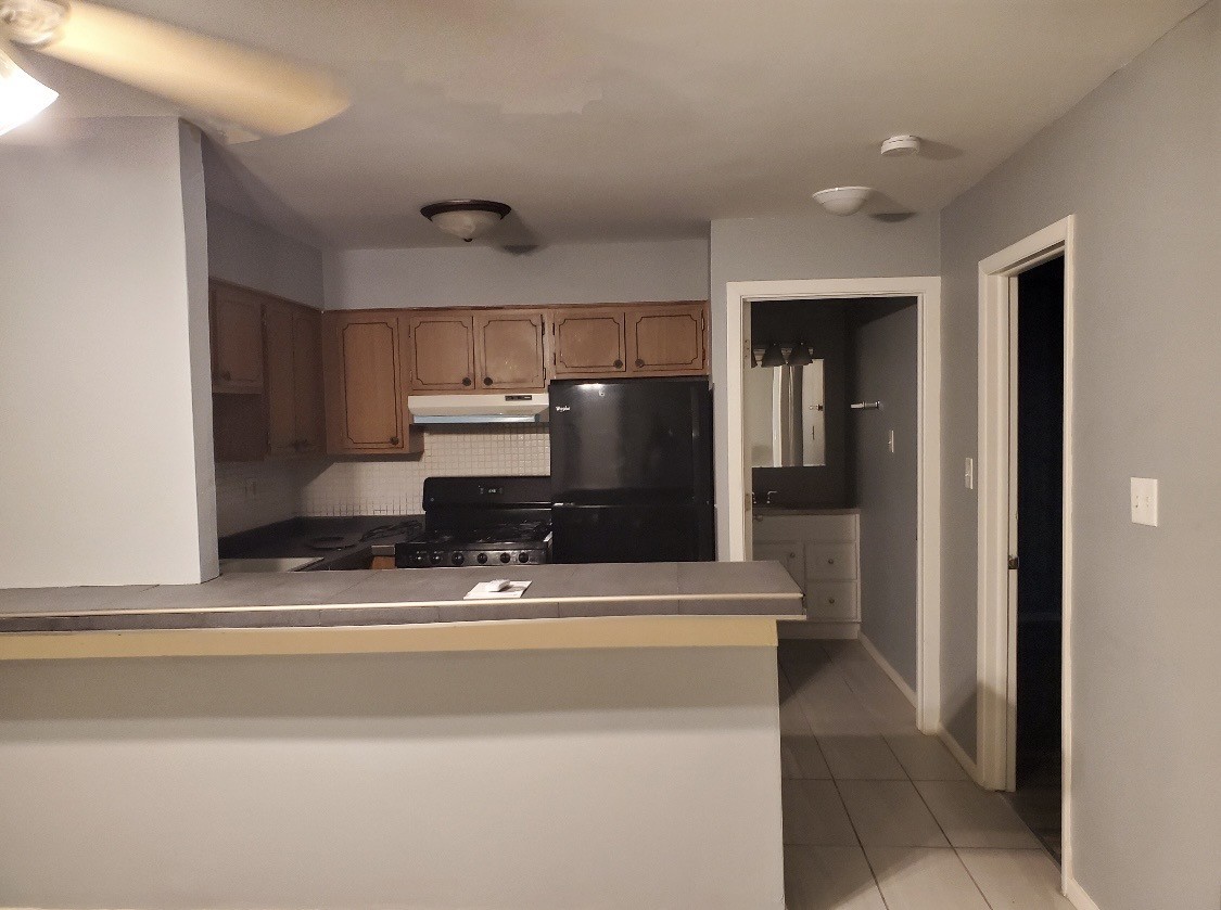 550 Michigan City Road, Unit 1C Calumet City, IL 60409 - Photo 2 of 6 a view of kitchen with refrigerator and cabinets